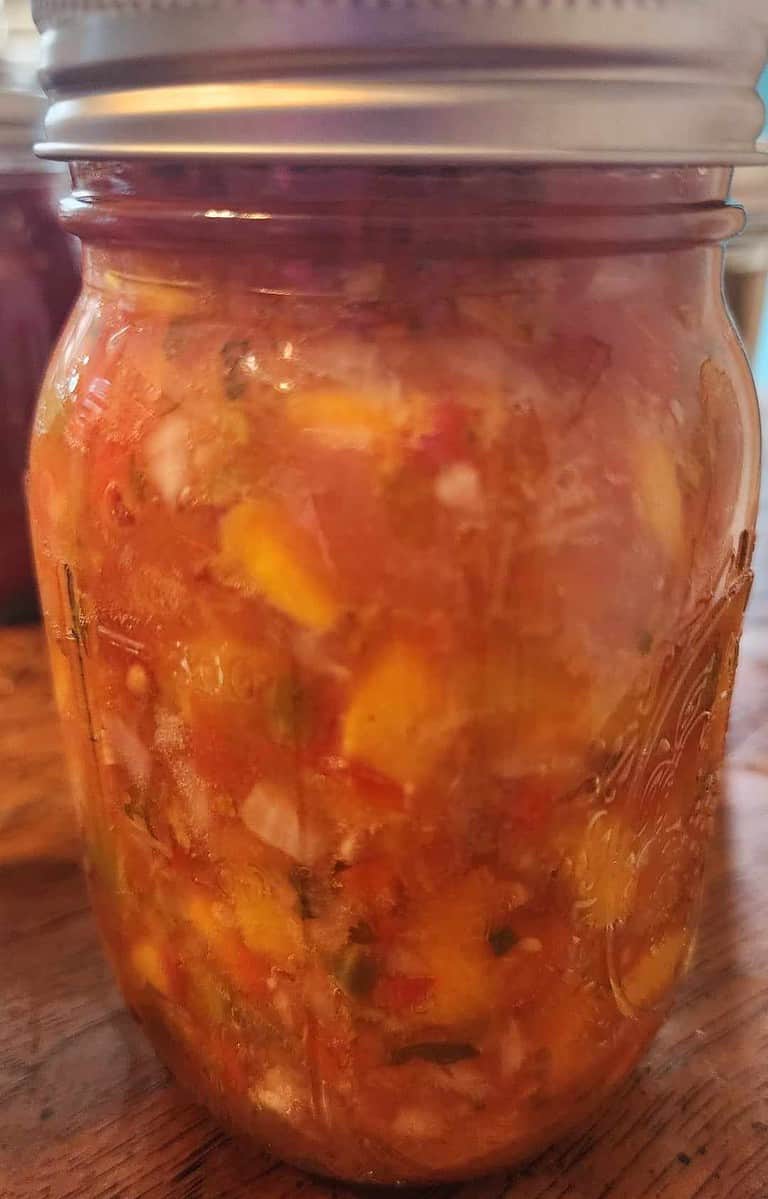 Jar of peach salsa