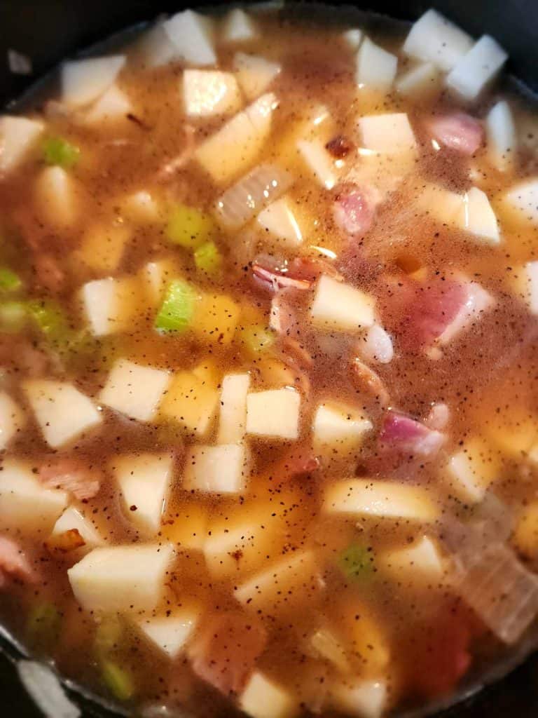 loaded potato soup simmering before canning