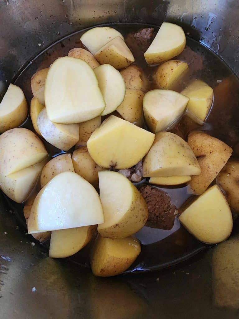 Potatoes added to the instant pot pot roast