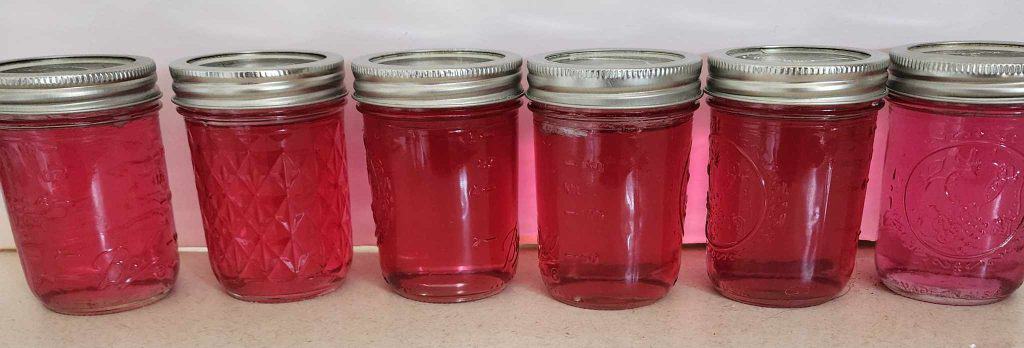 6 jars of violet jelly