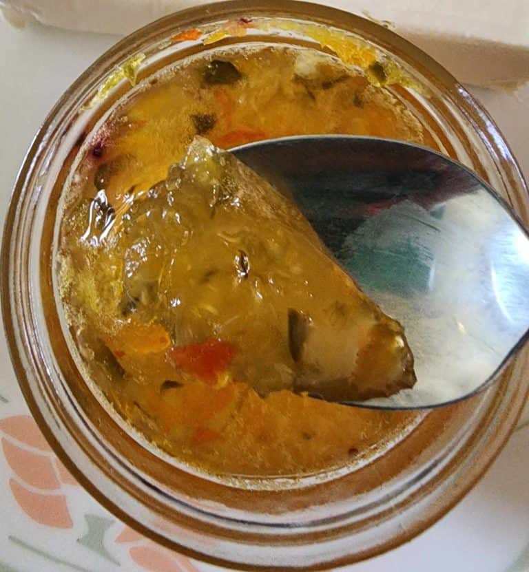 pineapple jalapeno jelly spooning it out of jar