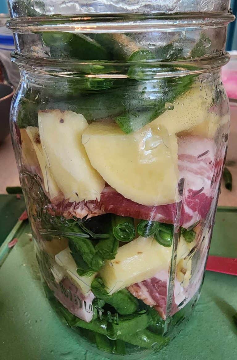 canning jar with green beans, bacon and potatoes for canning