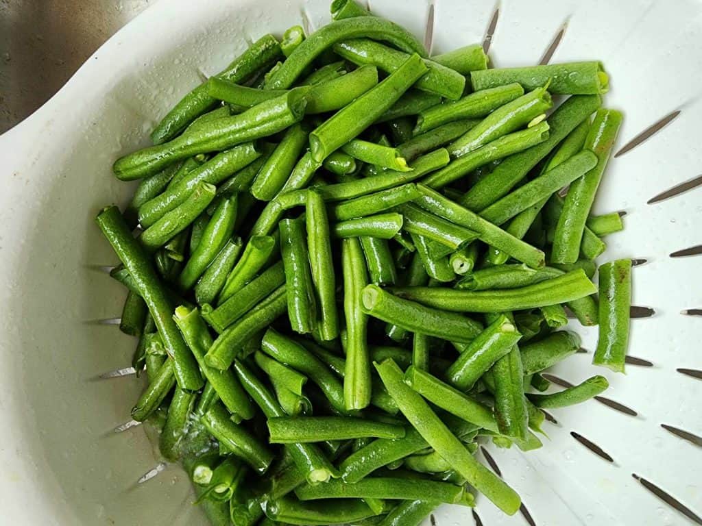 rinsing green beans for canning green beans, ham and potatoes