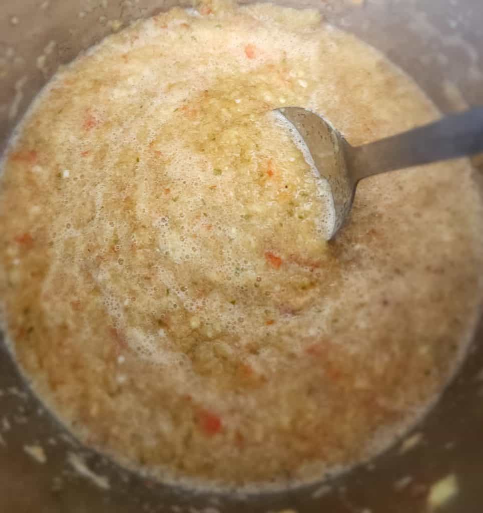 pineapple jalapeno bourbon bbq sauce being stirred
