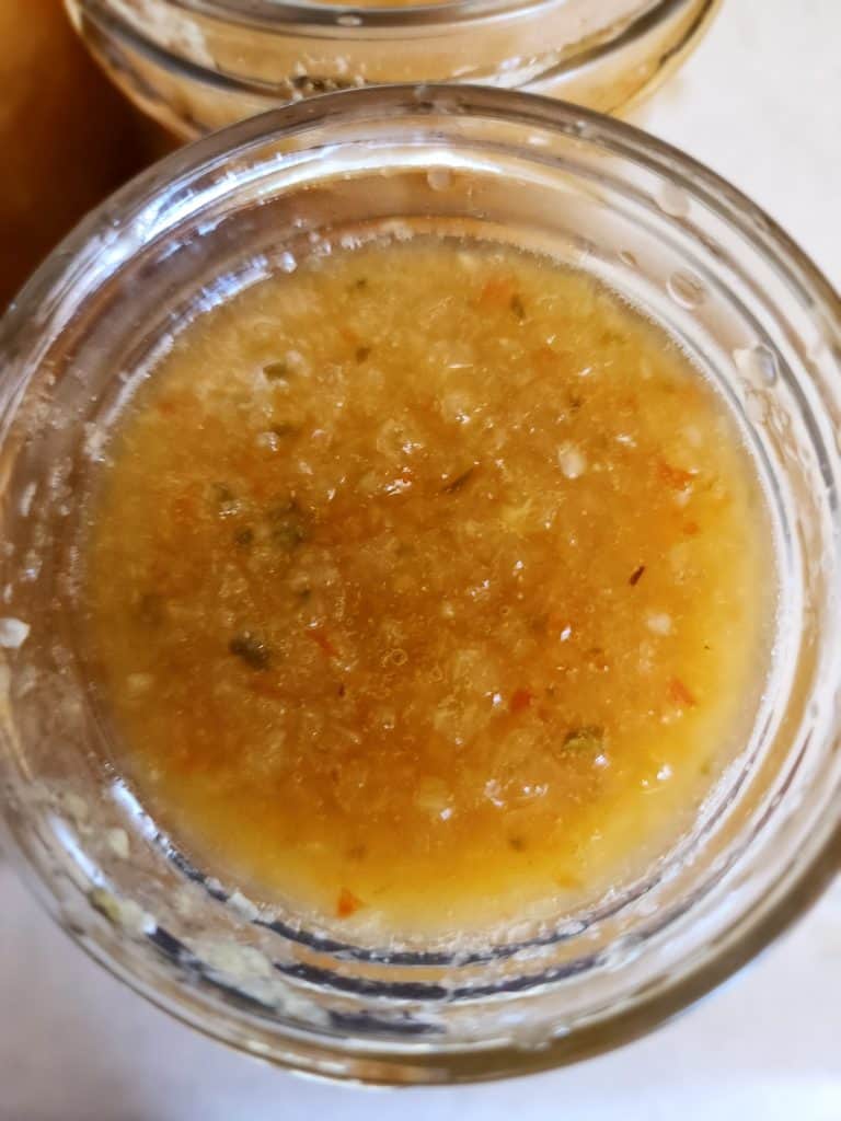 pineapple jalapeno bourbon bbq sauce top of jar