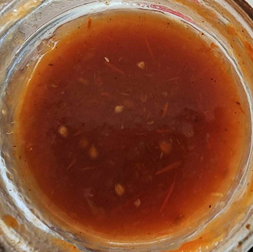 Homemade canned BBQ sauce from top of jar