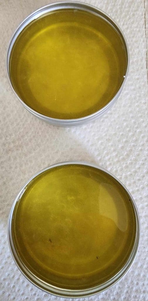calendula plantain salve pouring into tins