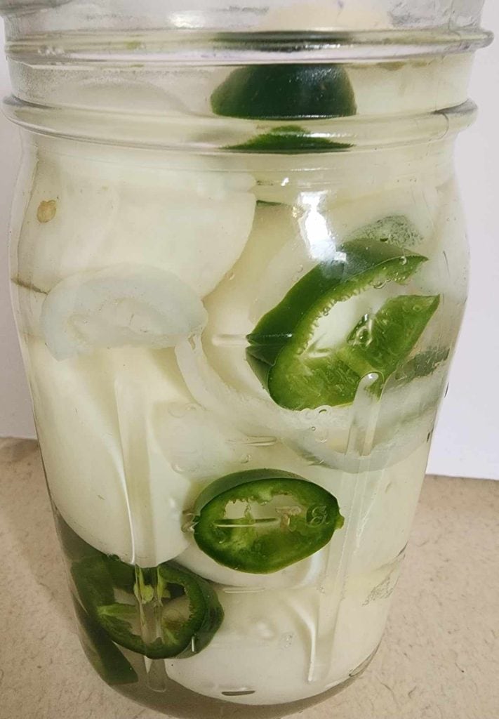 Brine added to jalapeno pickled eggs