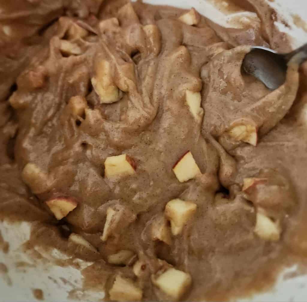 Diced apples mixed in with apple bread mix