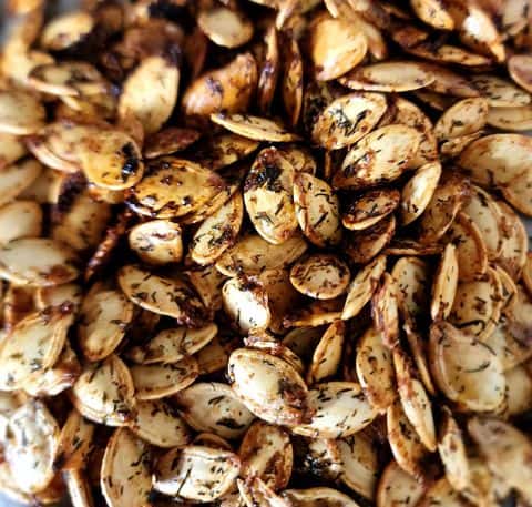 Dill pickle roasted pumpkin seeds
