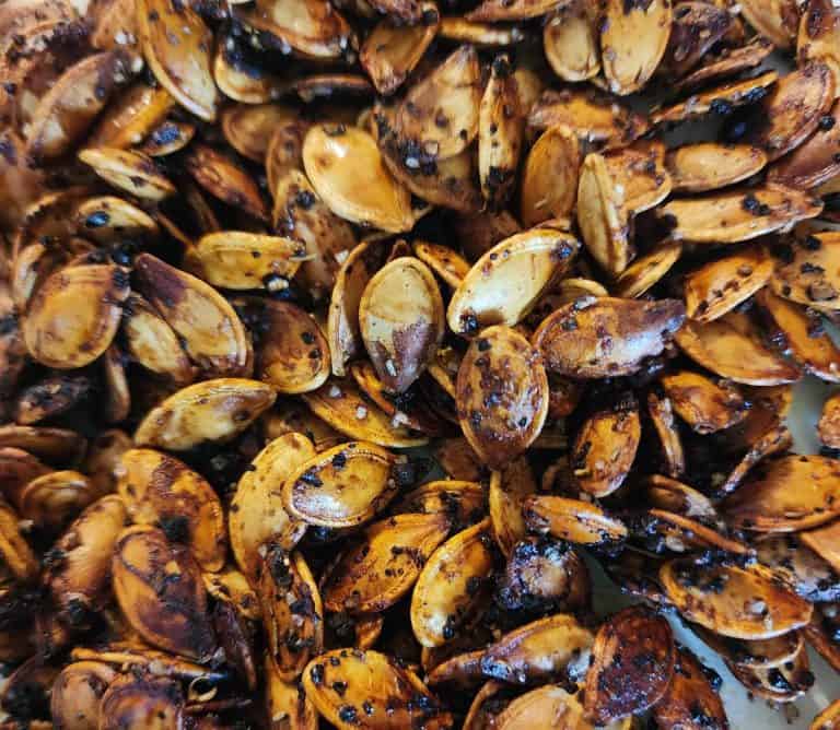 Closeup of steak seasoned pumpkin seeds