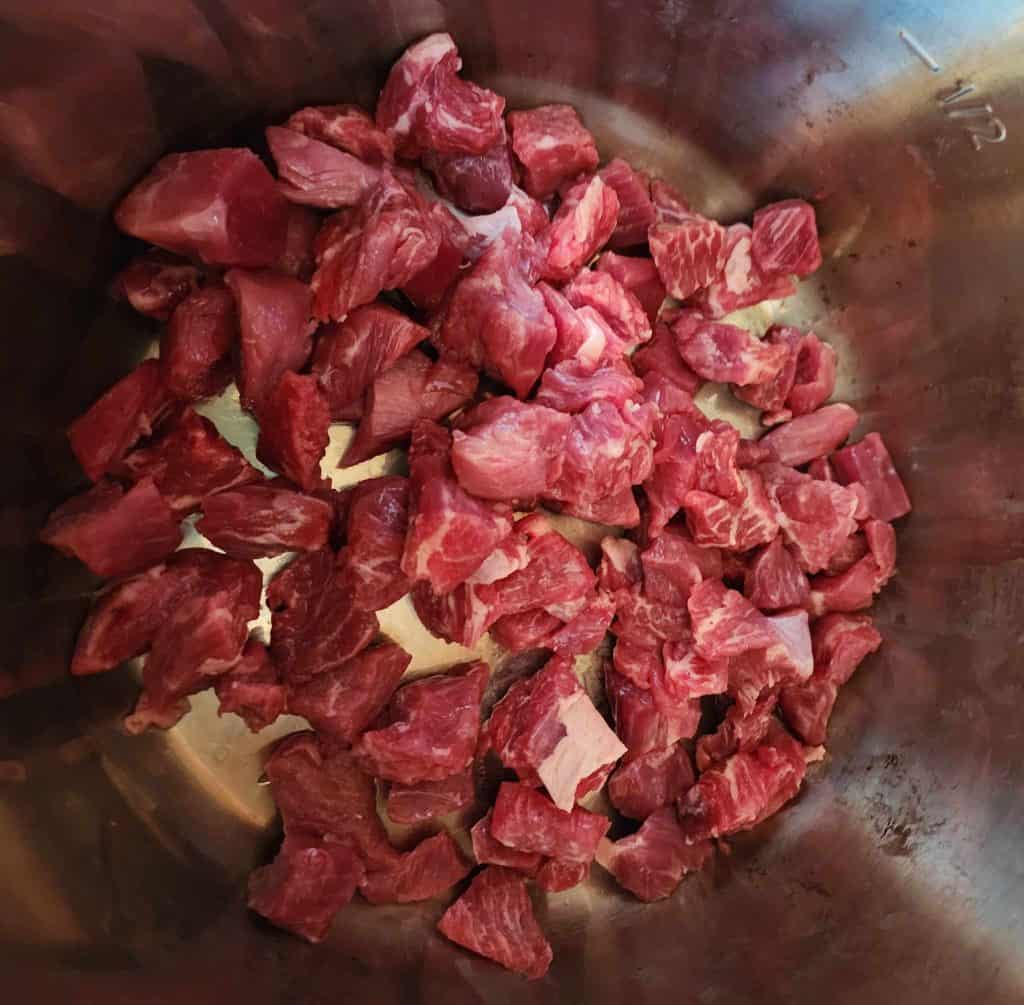 beef stew meat added to the instant pot for instant pot beef stew recipe