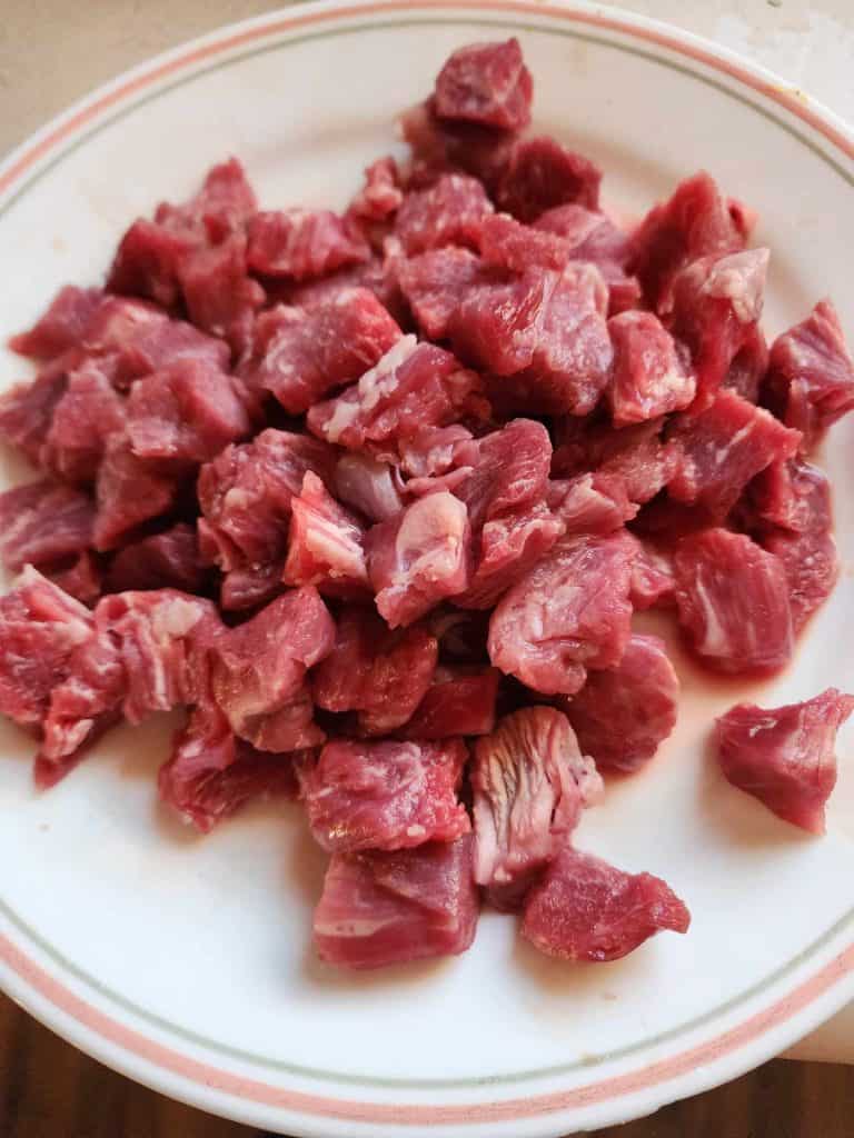 Beef stew meat cut up into bite size pieces for instant pot beef stew recipe