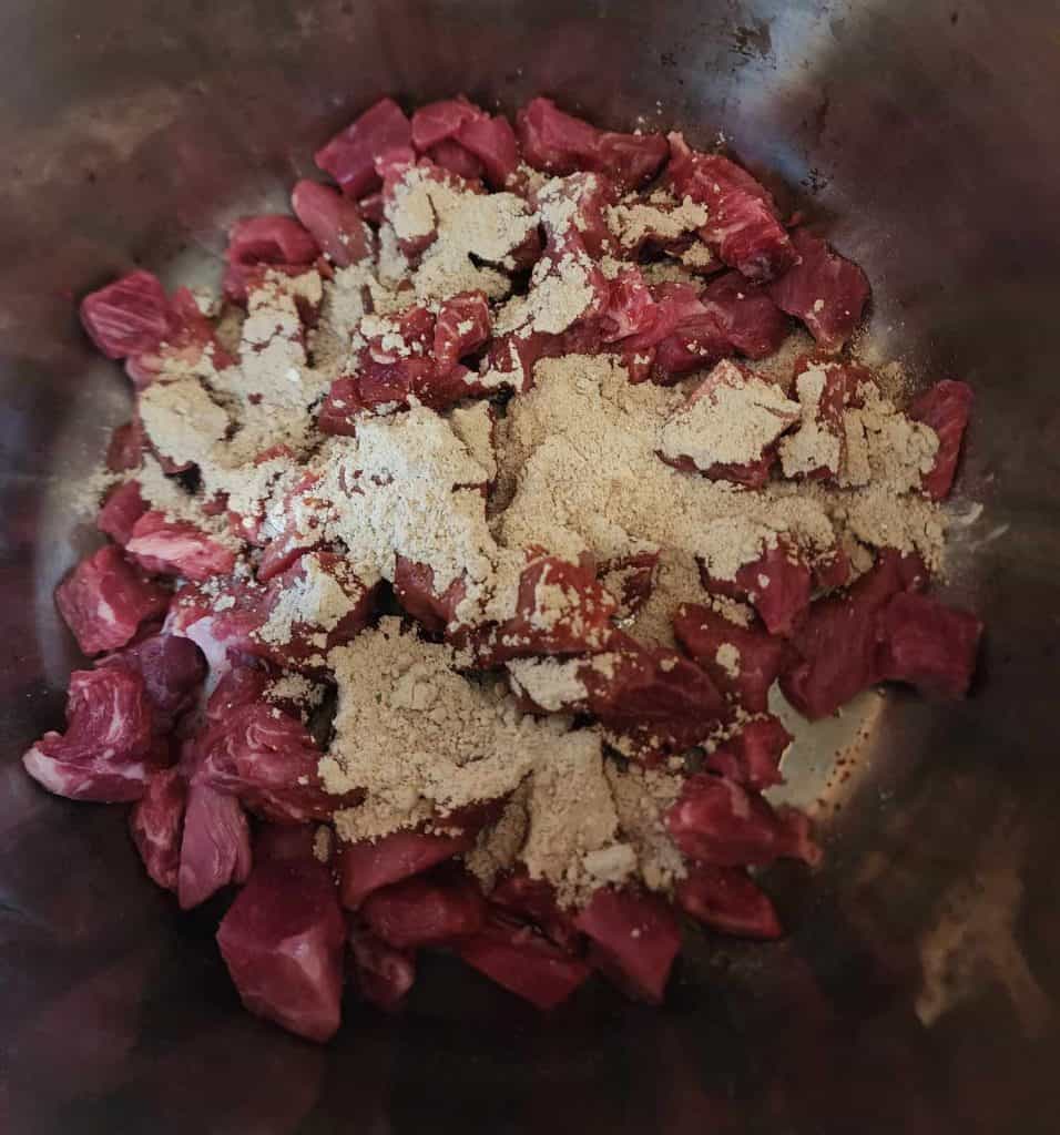 beef stew seasoning added to the beef in the instant pot