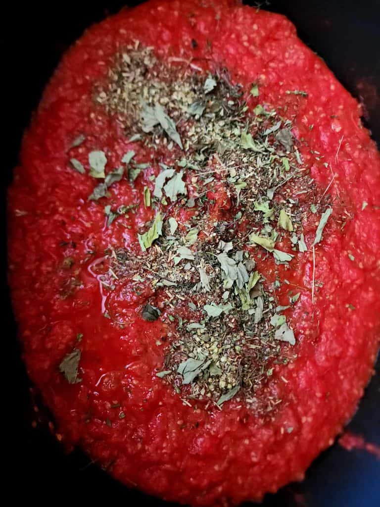 pizza sauce in slow cooker made from frozen tomatoes