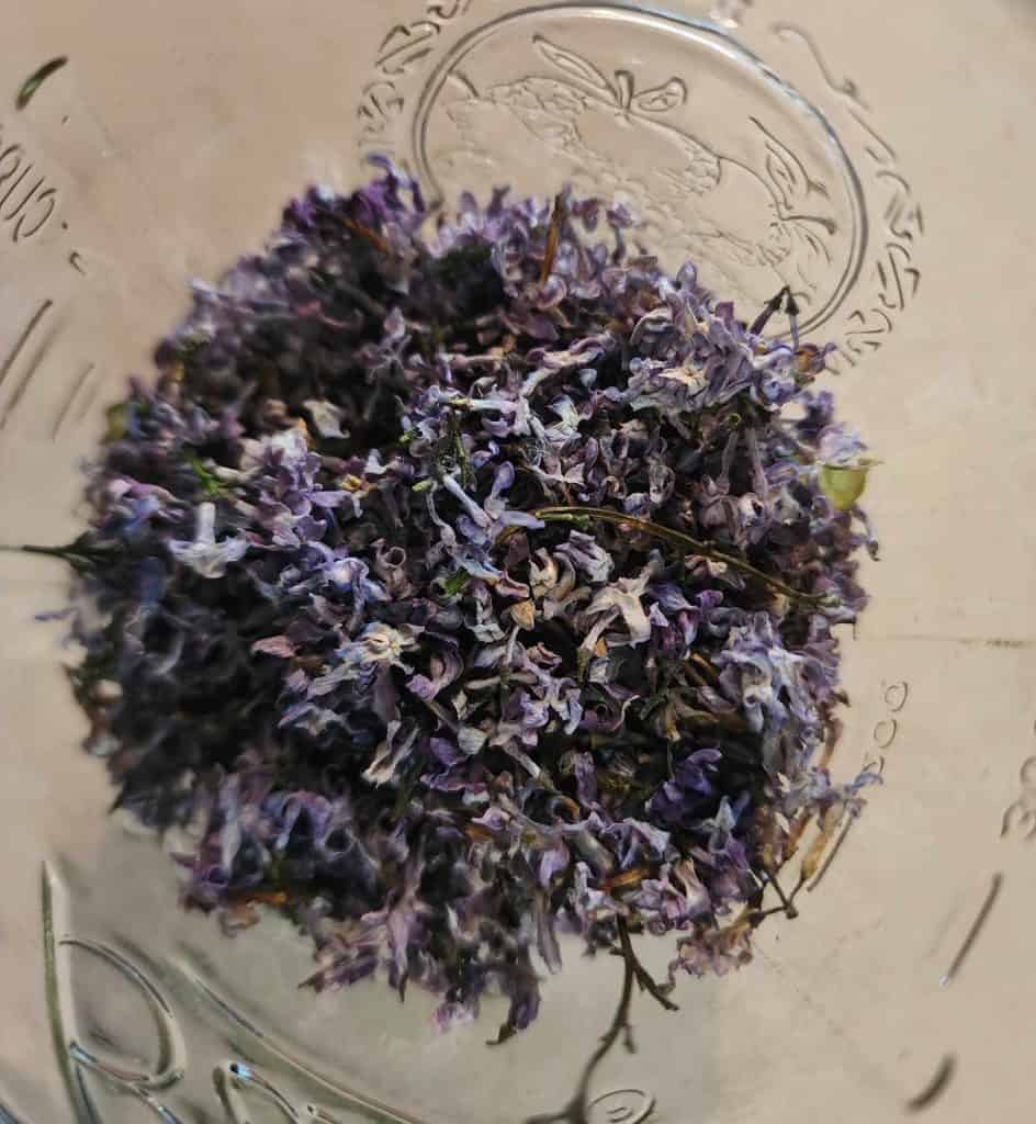 dried flowers in a jar to make lilac oil