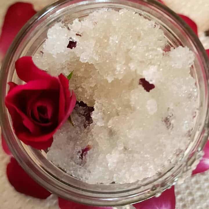 rose salt scrub in a jar with rose bud