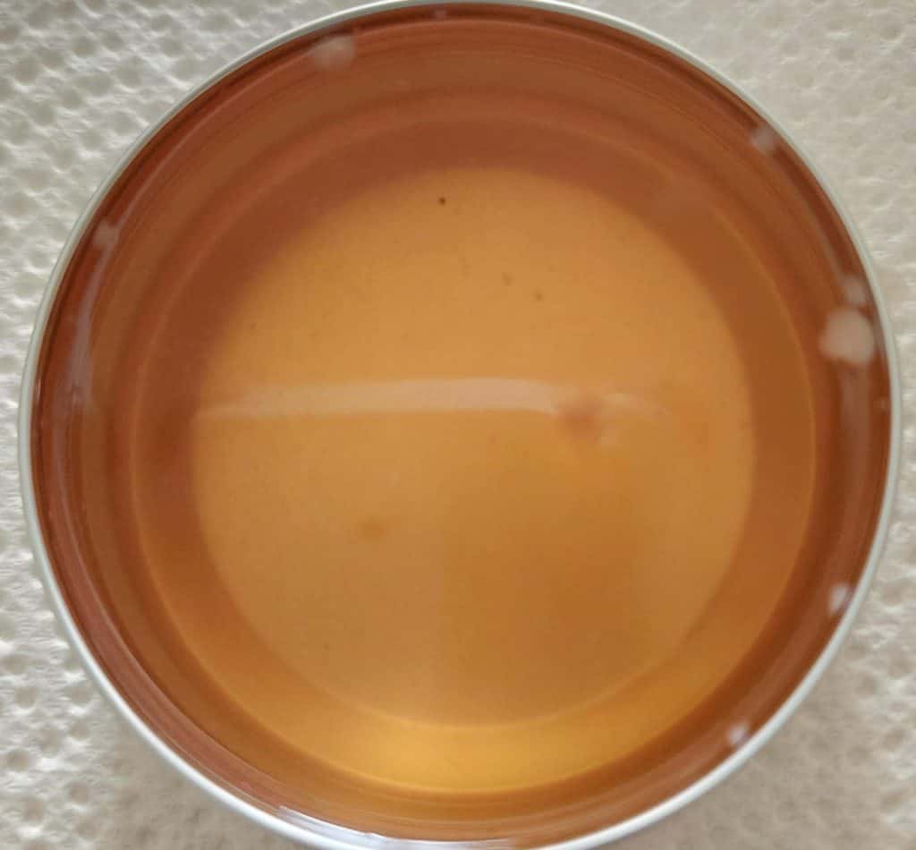 liquid rose salve in tin