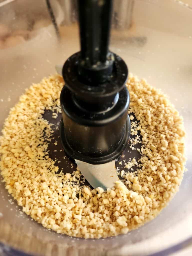 pine nuts processed to make homemade basil pesto