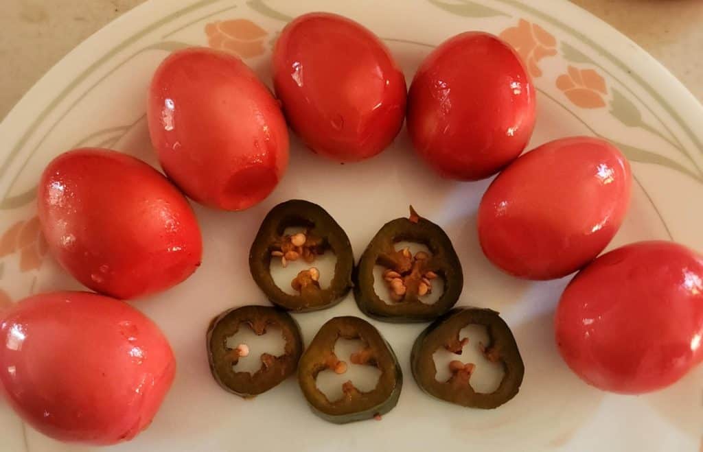 Bloody Mary Pickled eggs with jalapeno slices
