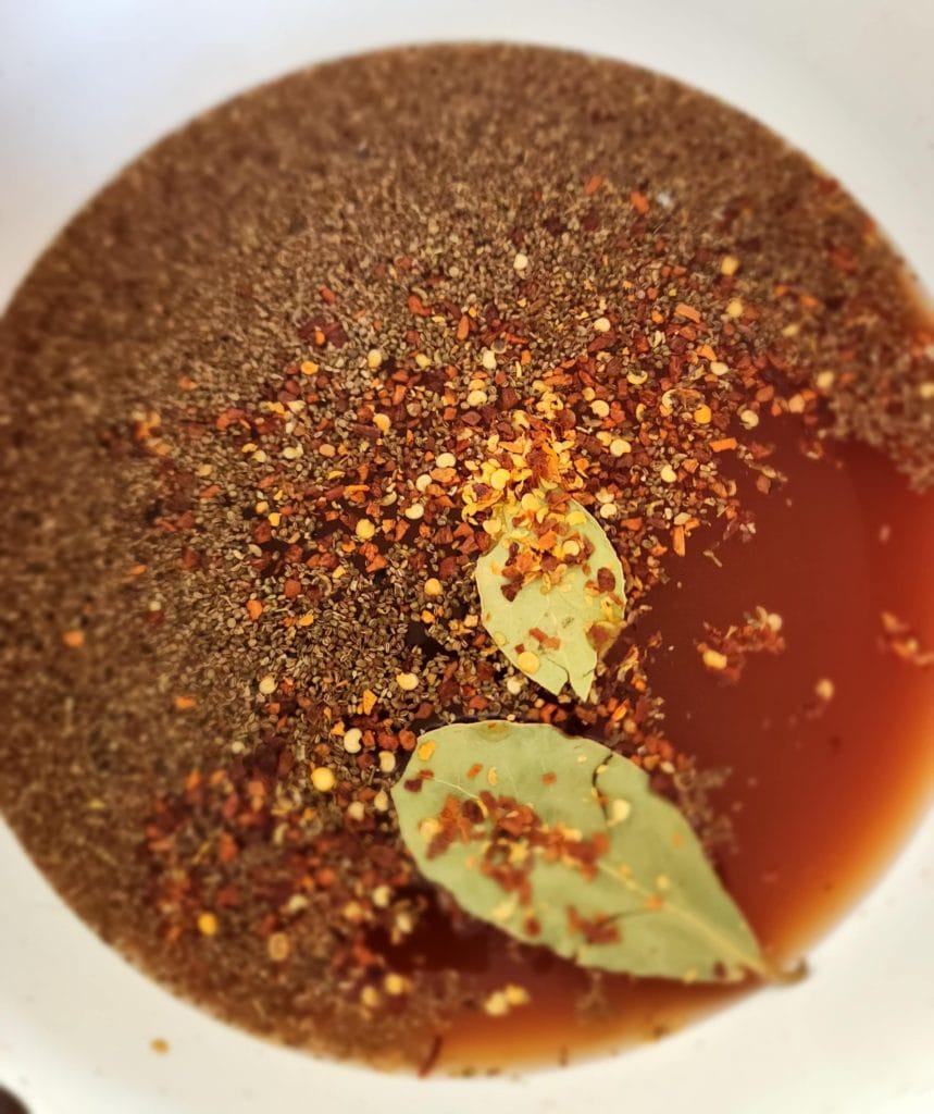 Added ingredients to sauce pan to make brine for bloody Mary pickled eggs