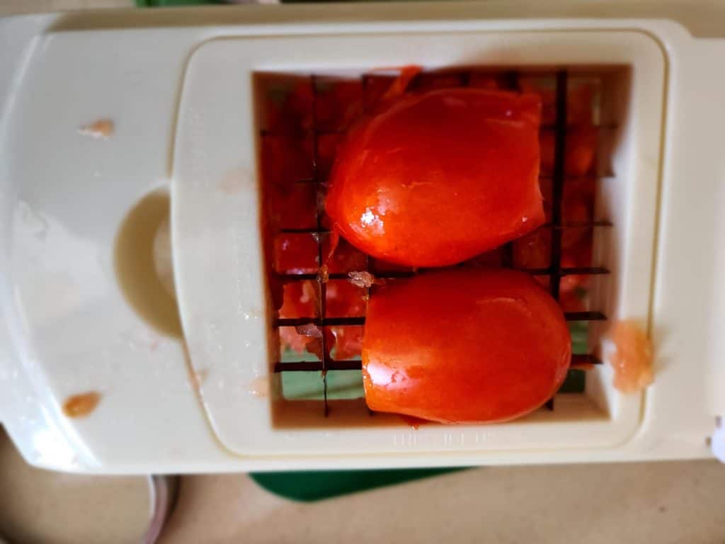 tomatoes on vegetable chopper
