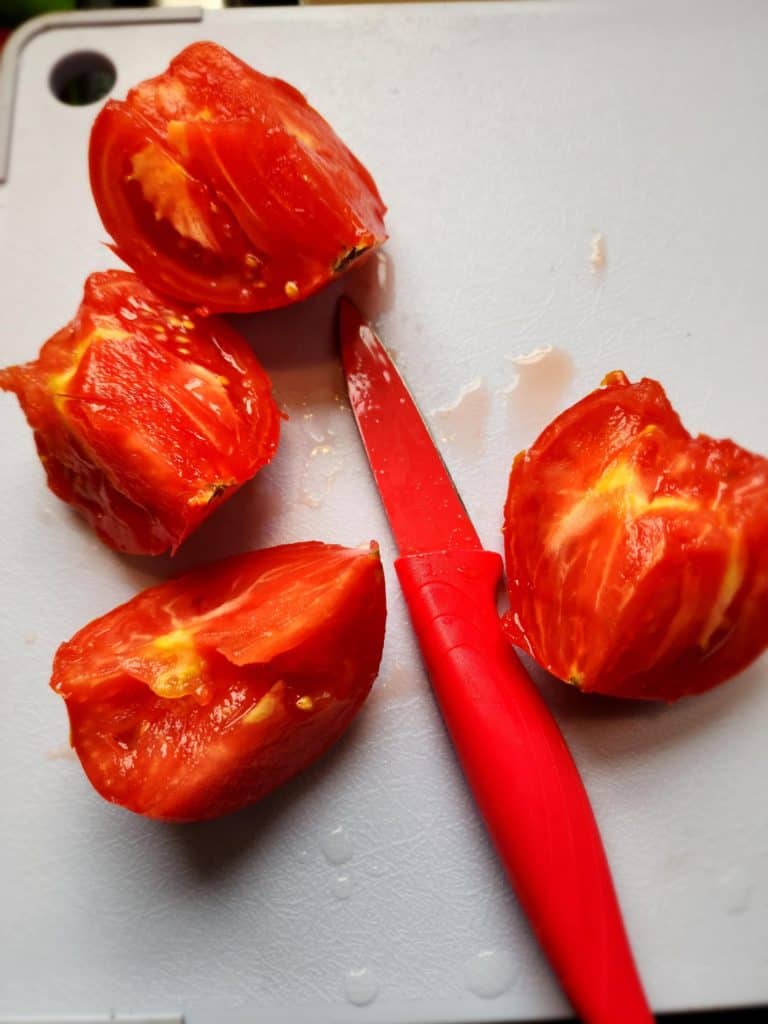 quartered tomatoes to make tomato juice