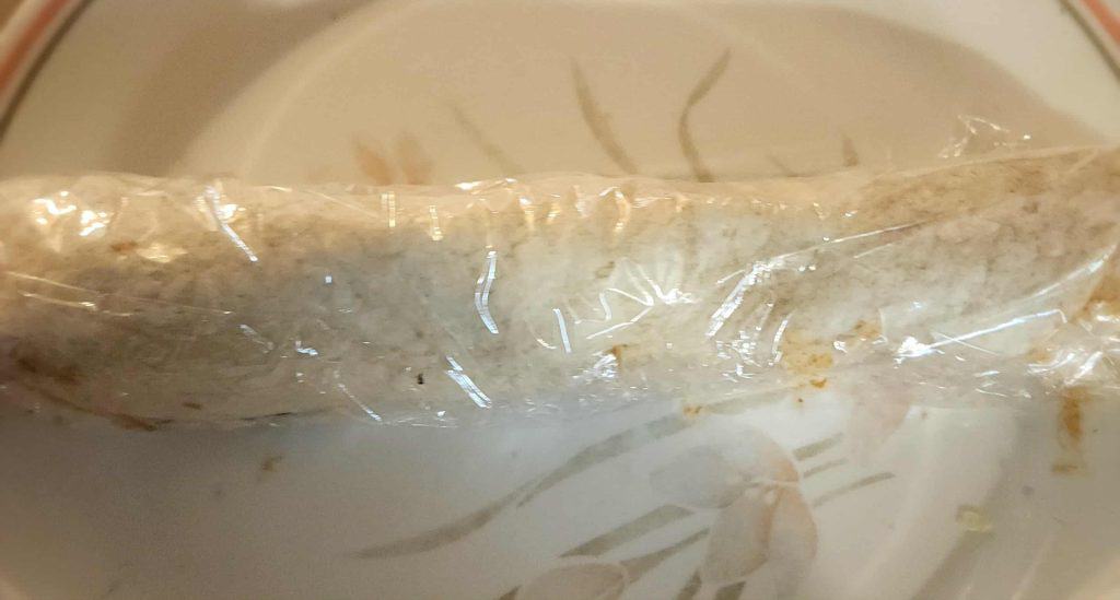 Mexican roll up wrapped in plastic