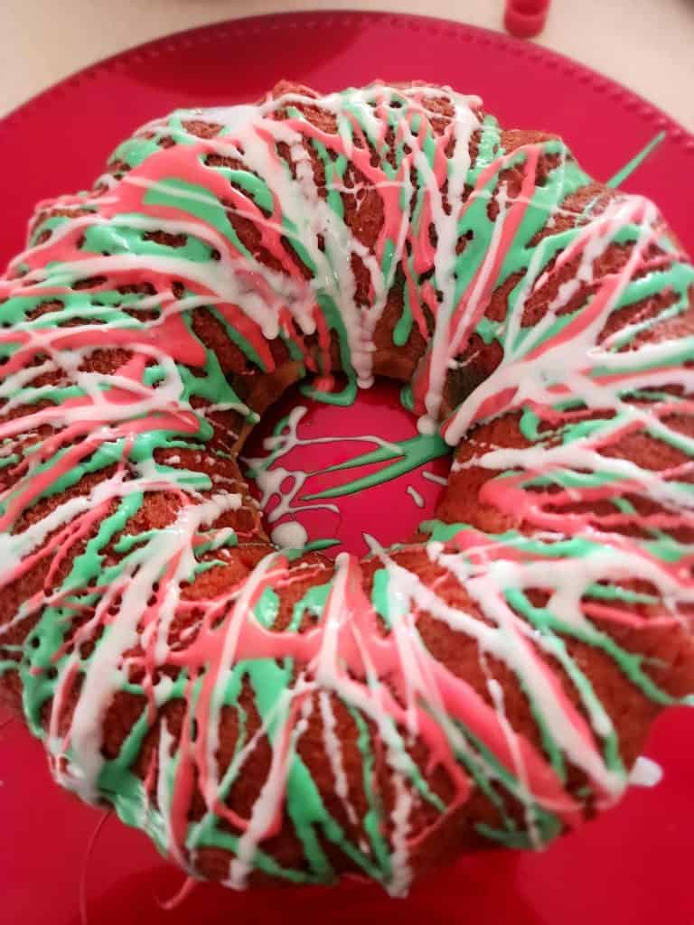 Green, red and white frosting on Christmas cake