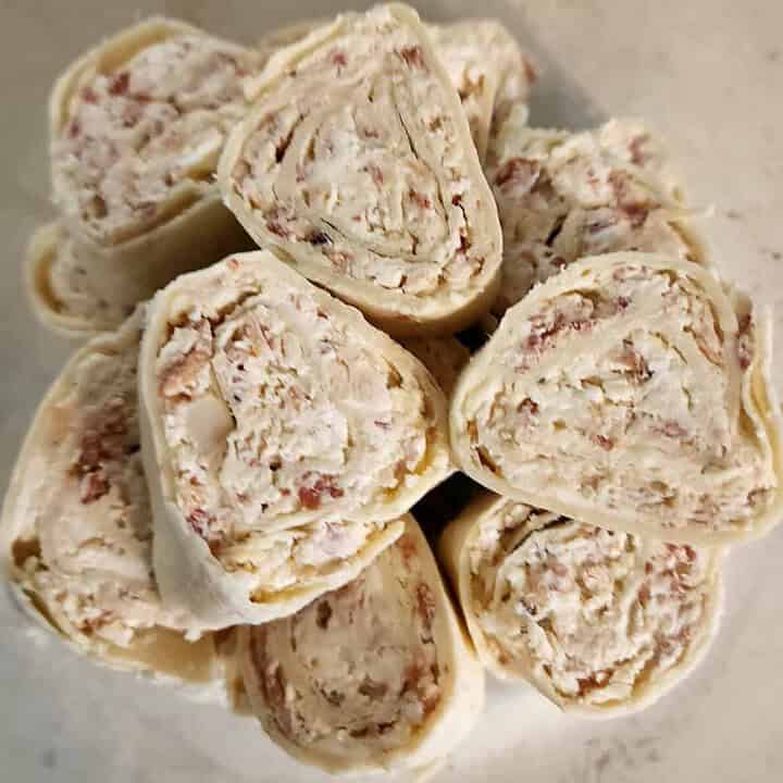 chicken caesar roll ups in a bowl