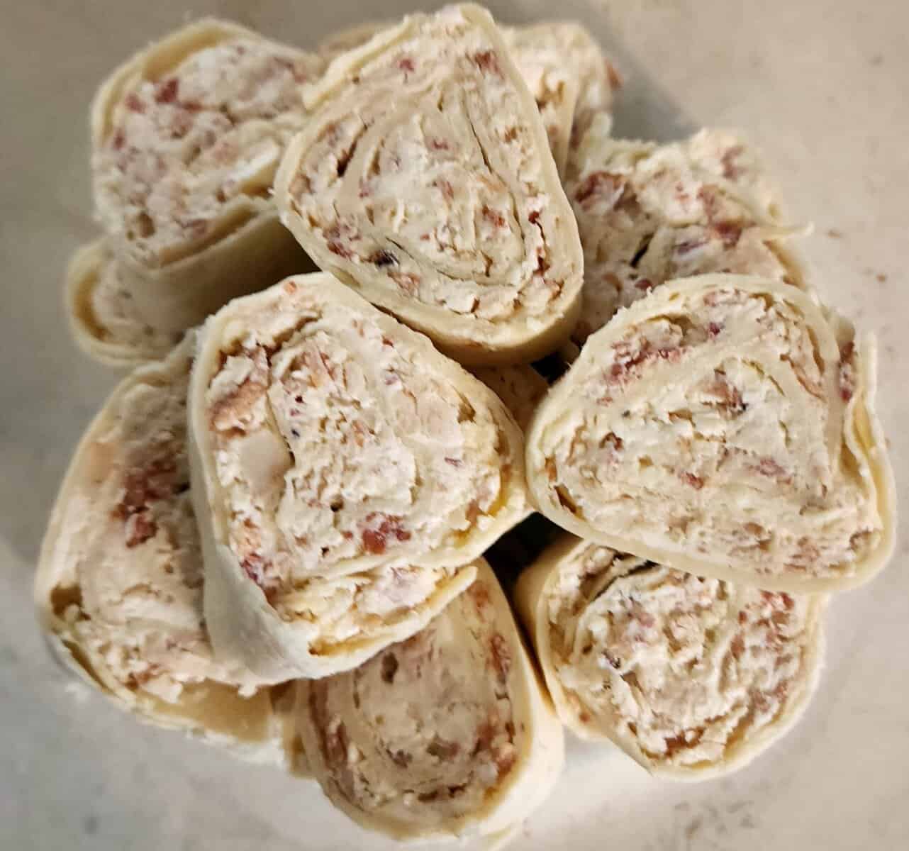 chicken caesar roll ups in a bowl