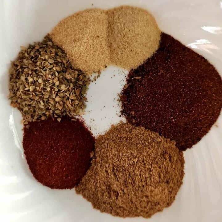 chili seasoning ingredients separated out in a bowl
