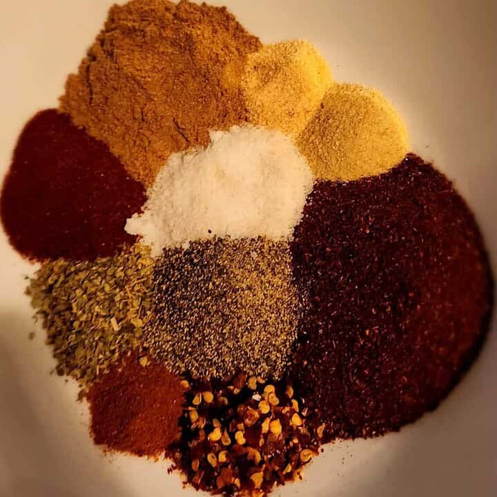 taco seasoning ingredients separated in a bowl