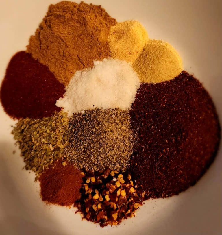 taco seasoning ingredients separated in a bowl