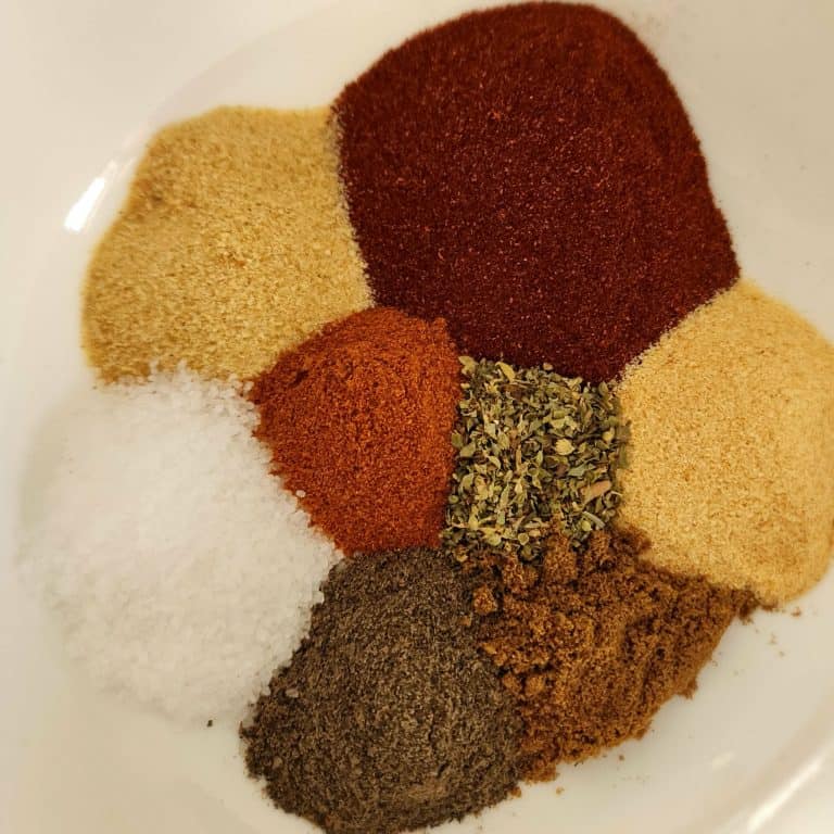 Blackened seasoning ingredients separate in a bowl
