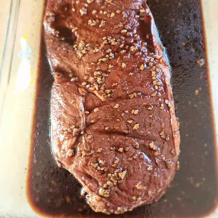 marinating steak in pan