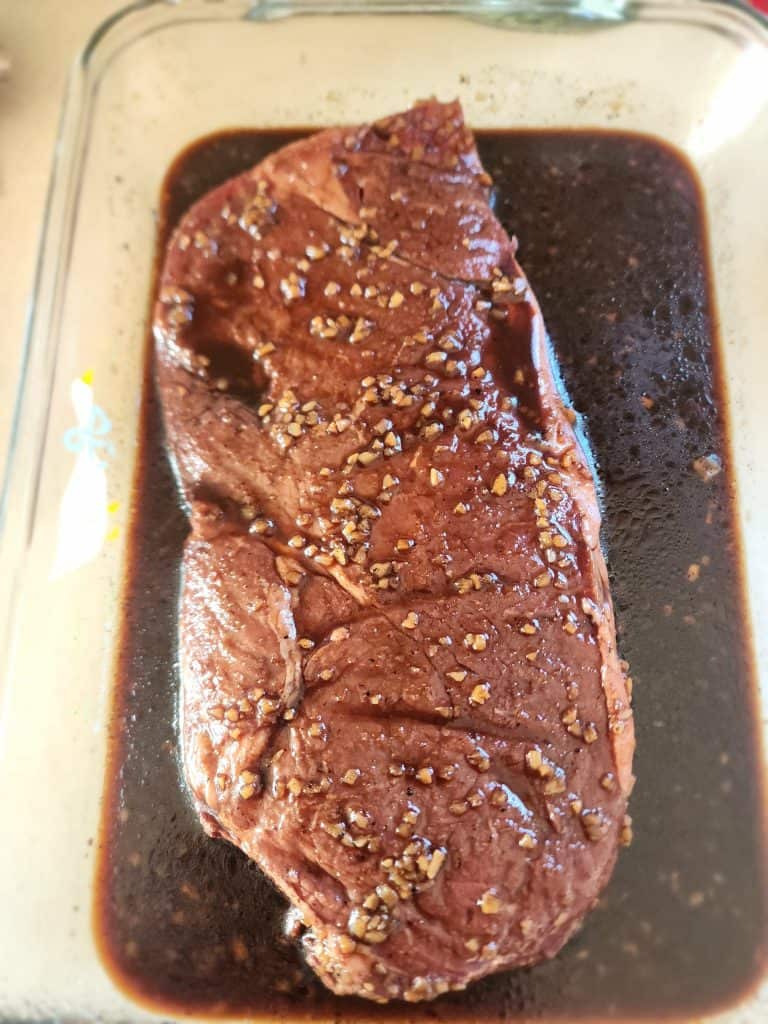 marinating steak in pan