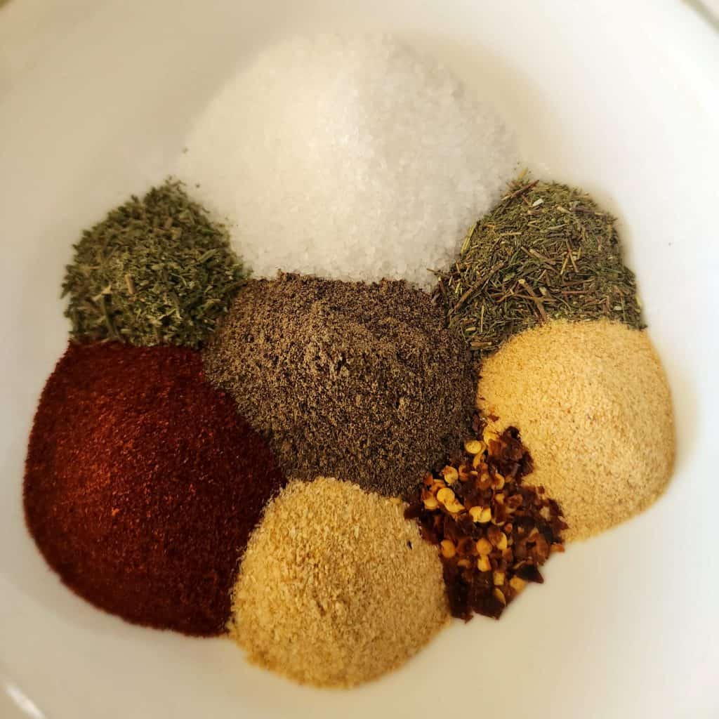 ingredients for steak seasoning in a bowl