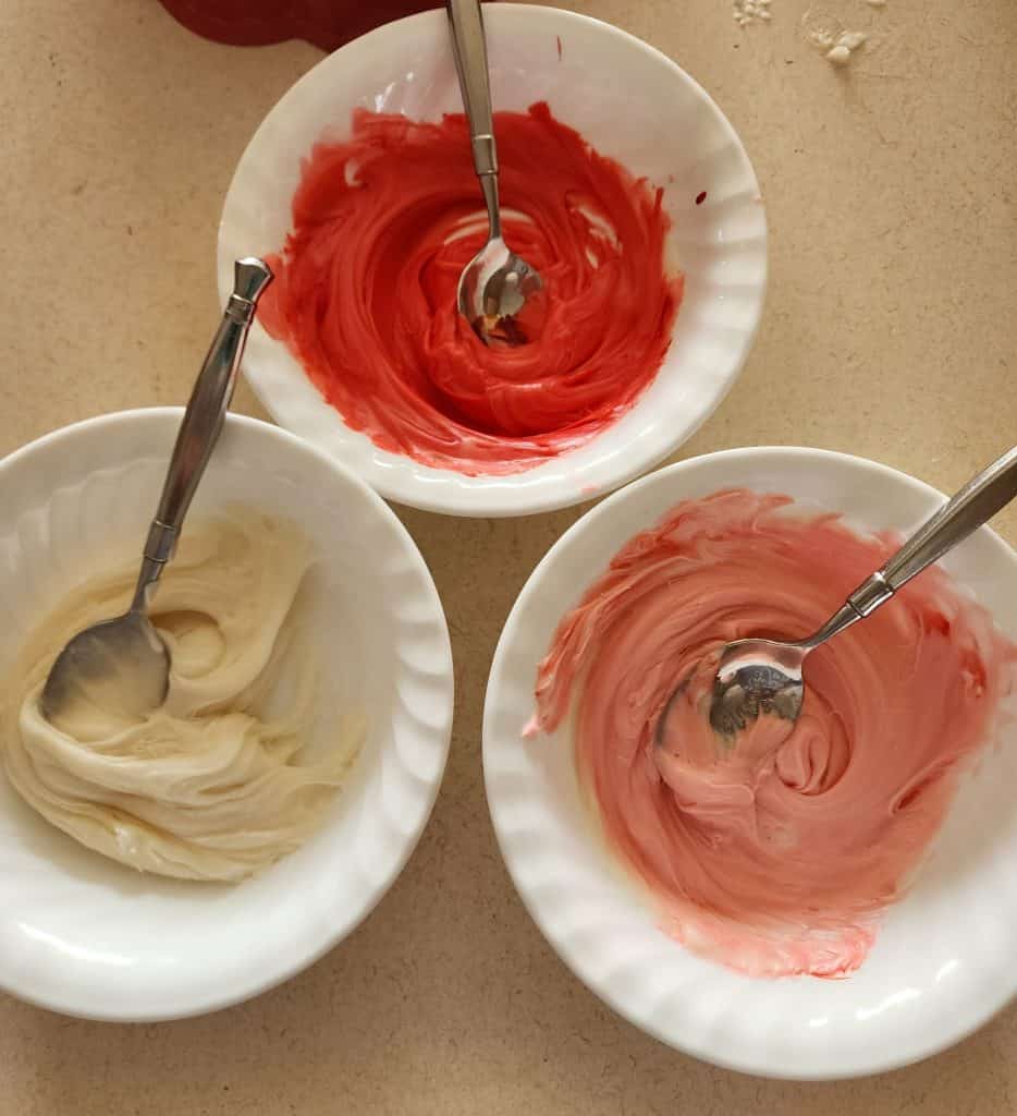 3 bowls of icing for Valentine cake
