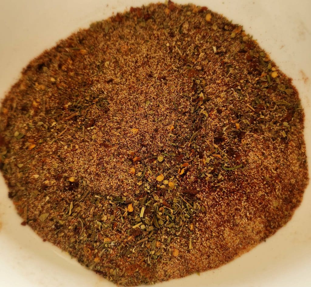 beef stew ingredients mixed in a bowl