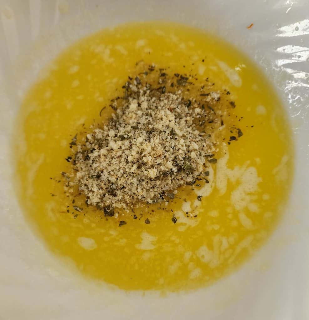 added garlic bread seasoning to melted butter