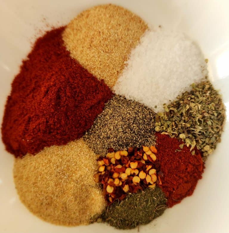 Cajun seasoning ingredients separate in a bowl