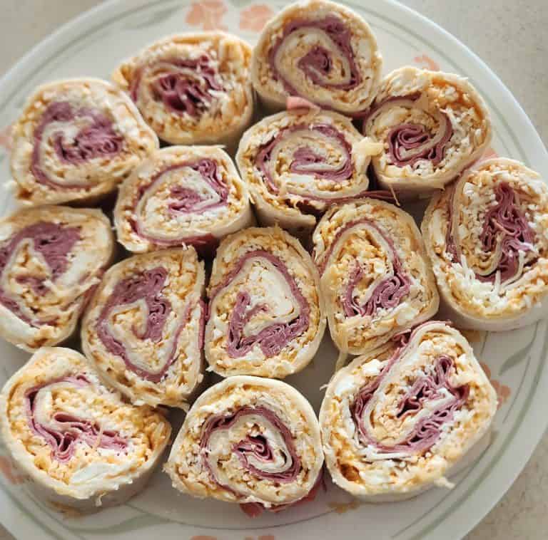 Reuben roll ups on a plate